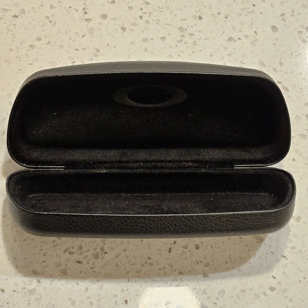 Oakley Black Hard Clam Shell Dimple Glasses Case | Black Embossed Logo